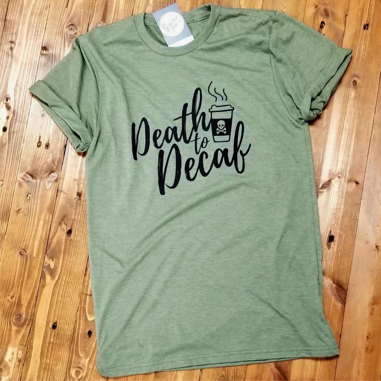 Olive green Death to Decaf graphic t-shirt by The Graphic Tee, casual short sleeve tee with bold printed design.