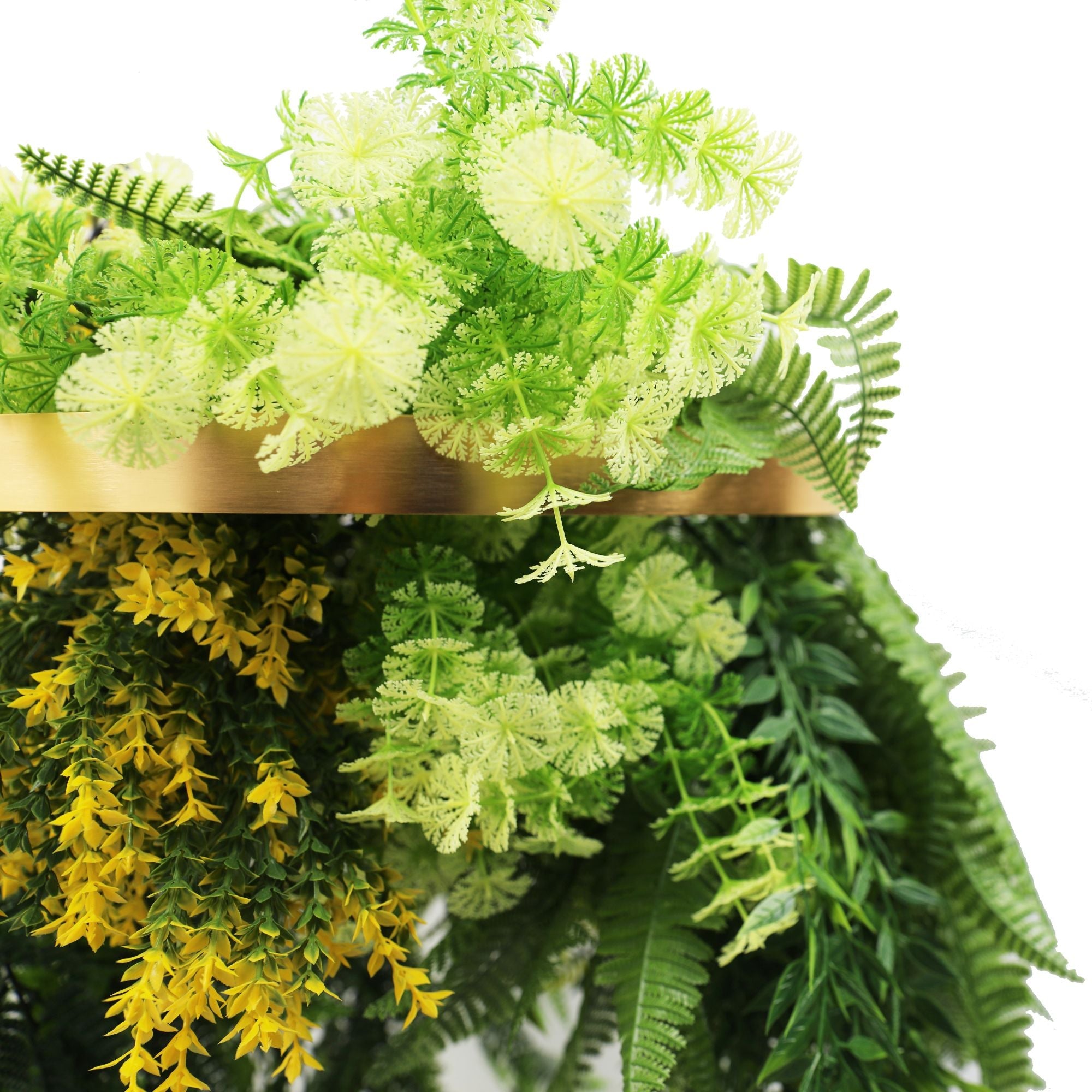 Artificial hanging plant chandelier with bright tropical foliage and draping ferns in a gold circular frame, UV resistant for outdoor use.
