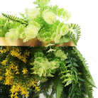 Artificial hanging plant chandelier with gold frame, tropical foliage, and draping ferns, UV resistant for indoor or outdoor decor.