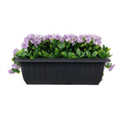 Artificial draping lilac flowering window box planter with UV-resistant hanging plants, 20x14 inches, by Designer Plants USA.