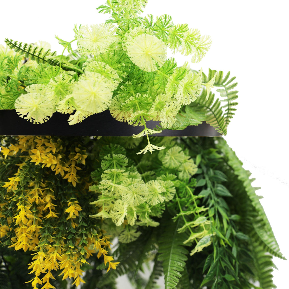 Close-up of black-framed artificial hanging disc with bright tropical foliage and draping ferns, UV resistant, 15.75-inch Designer Plants USA