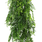 Dense tropical fern artificial hanging plant, 30 inches tall, UV resistant, with lush green fronds for indoor or outdoor decor.