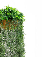 Artificial fern hanging basket from Designer Plants USA, UV resistant, lush green fern in a 13.8x55.1 inch hanging basket.