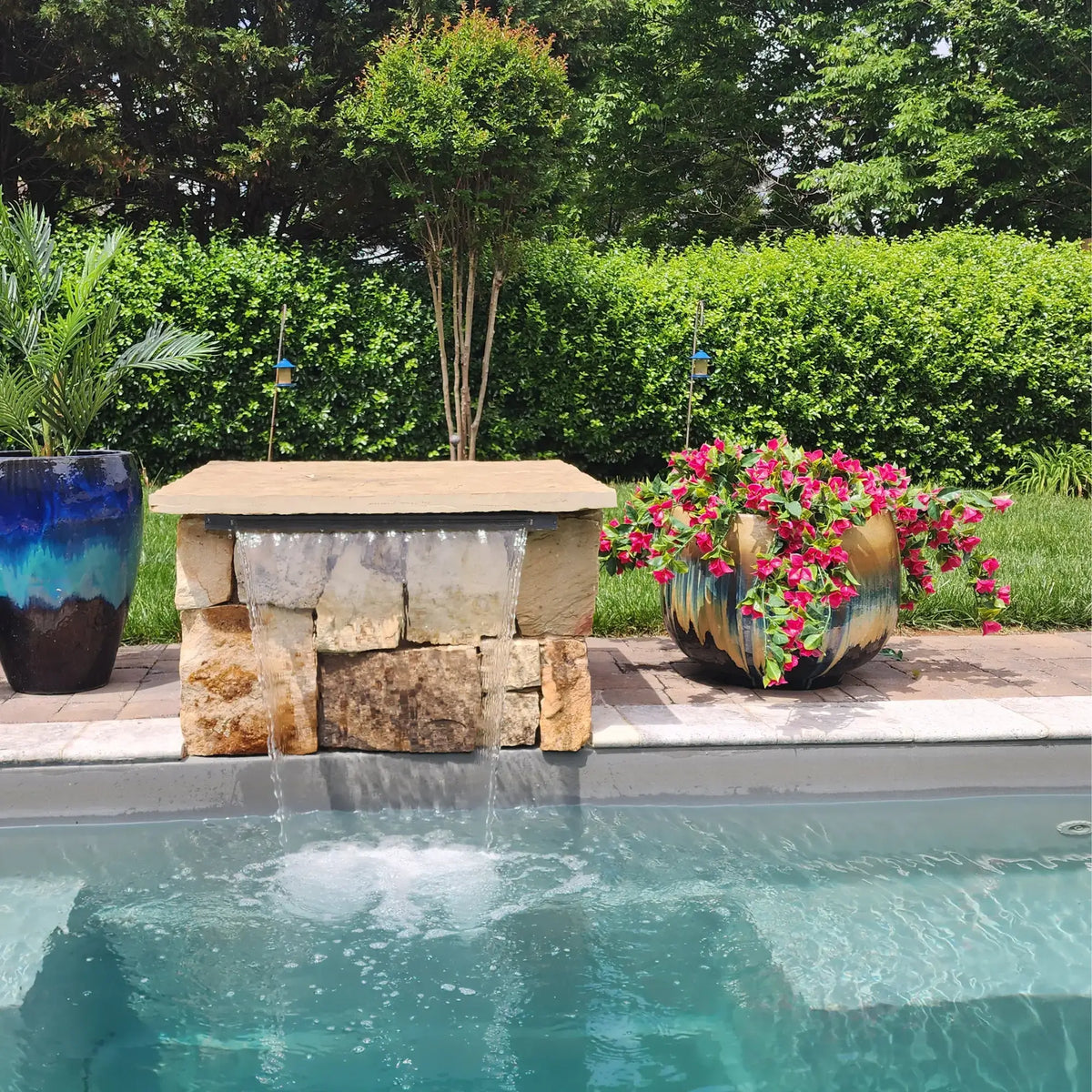 Five pink artificial Bougainvillea hanging plants, UV resistant, 35 inches tall, designed for outdoor decor by Designer Plants USA.