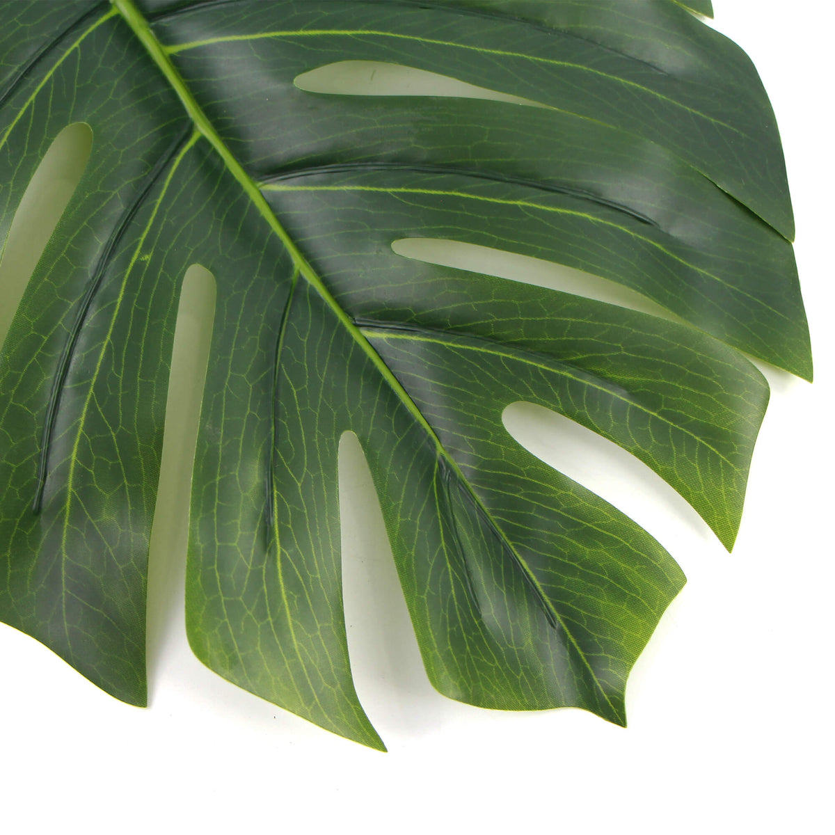 Artificial Philodendron leaf hanging plant from Designer Plants USA, 11.5 inches tall, with a realistic green leaf on a clear background.