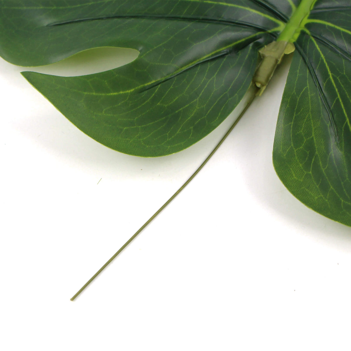 Artificial Philodendron leaf on a stem, 11.5 inches tall, from Designer Plants USA, perfect for hanging plant decor.