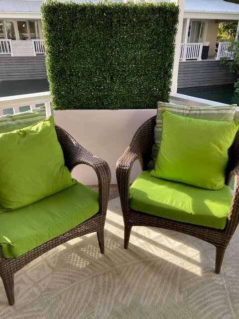 Two tone green faux boxwood hedge by Designer Plants USA, 40x40 inches, UV resistant, ideal for commercial outdoor use.