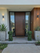 Artificial boxwood dog topiary for indoor and outdoor decor, styled as a lush, green topiary ball by Designer Plants USA.