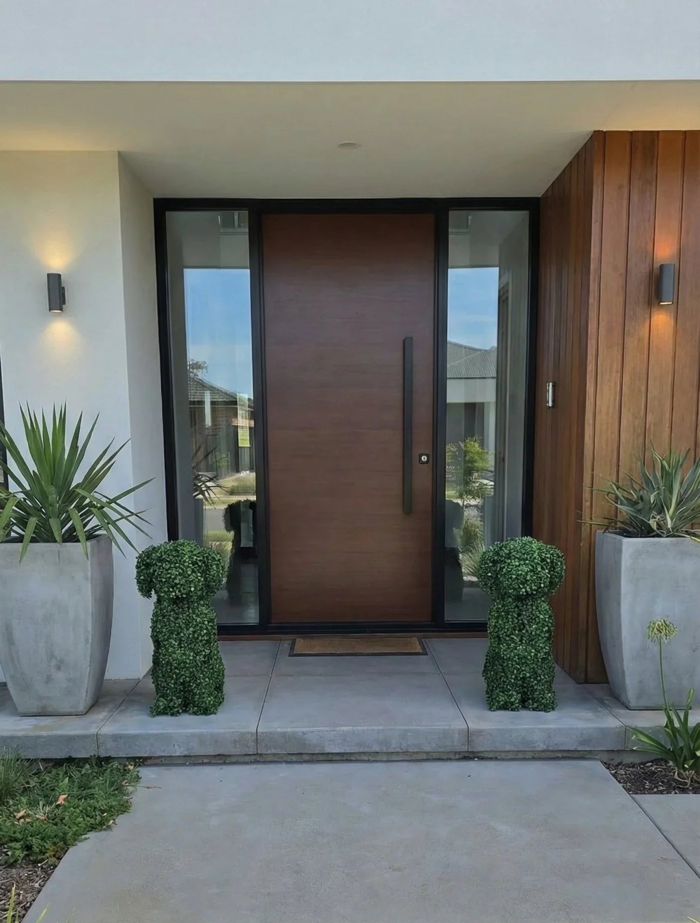 Artificial boxwood dog topiary for indoor and outdoor decor, styled as a lush, green topiary ball by Designer Plants USA.