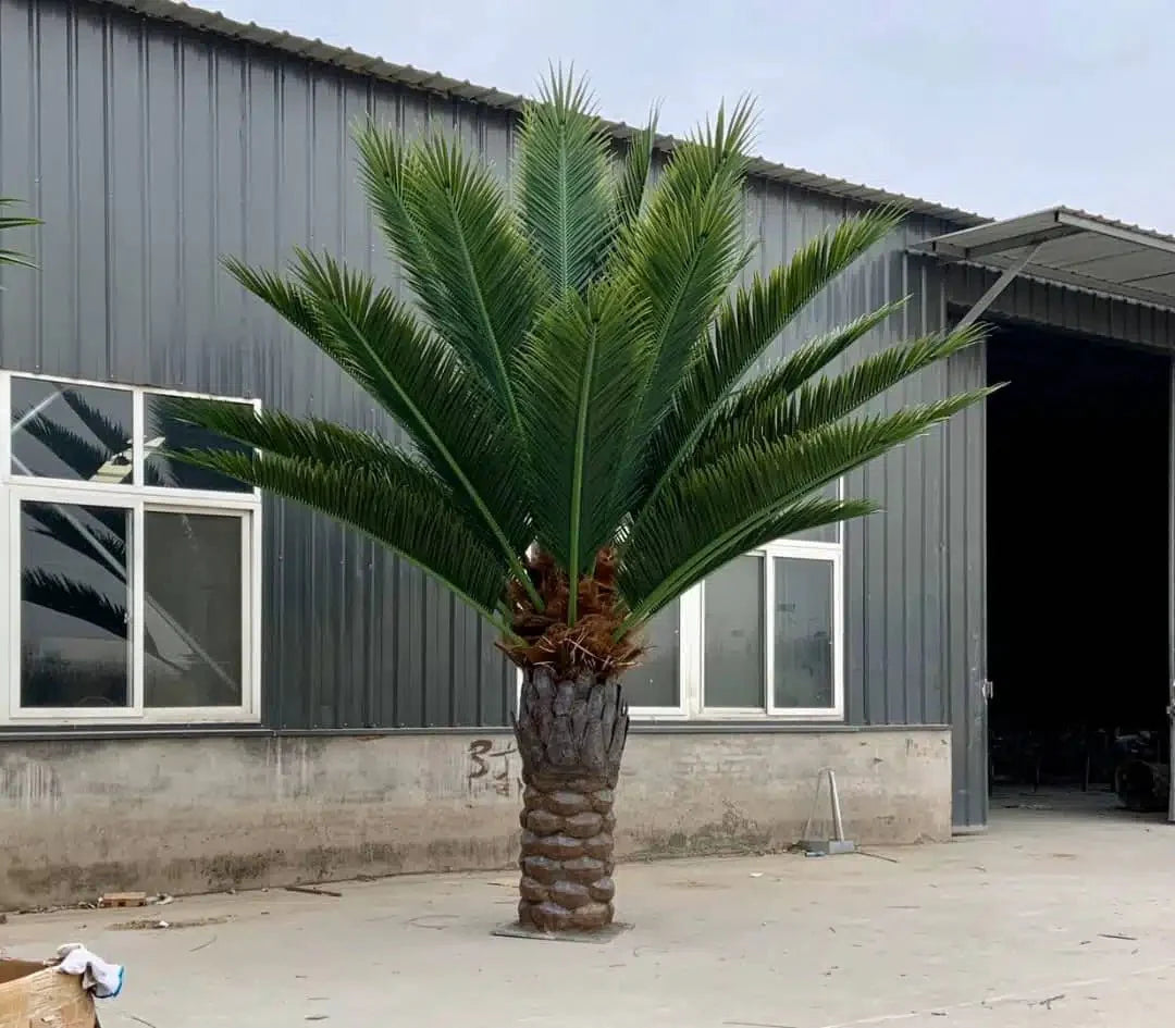 Tall 13 to 23-foot UV-resistant artificial Florida palm tree by Designer Plants USA, suitable for outdoor landscaping and decor.