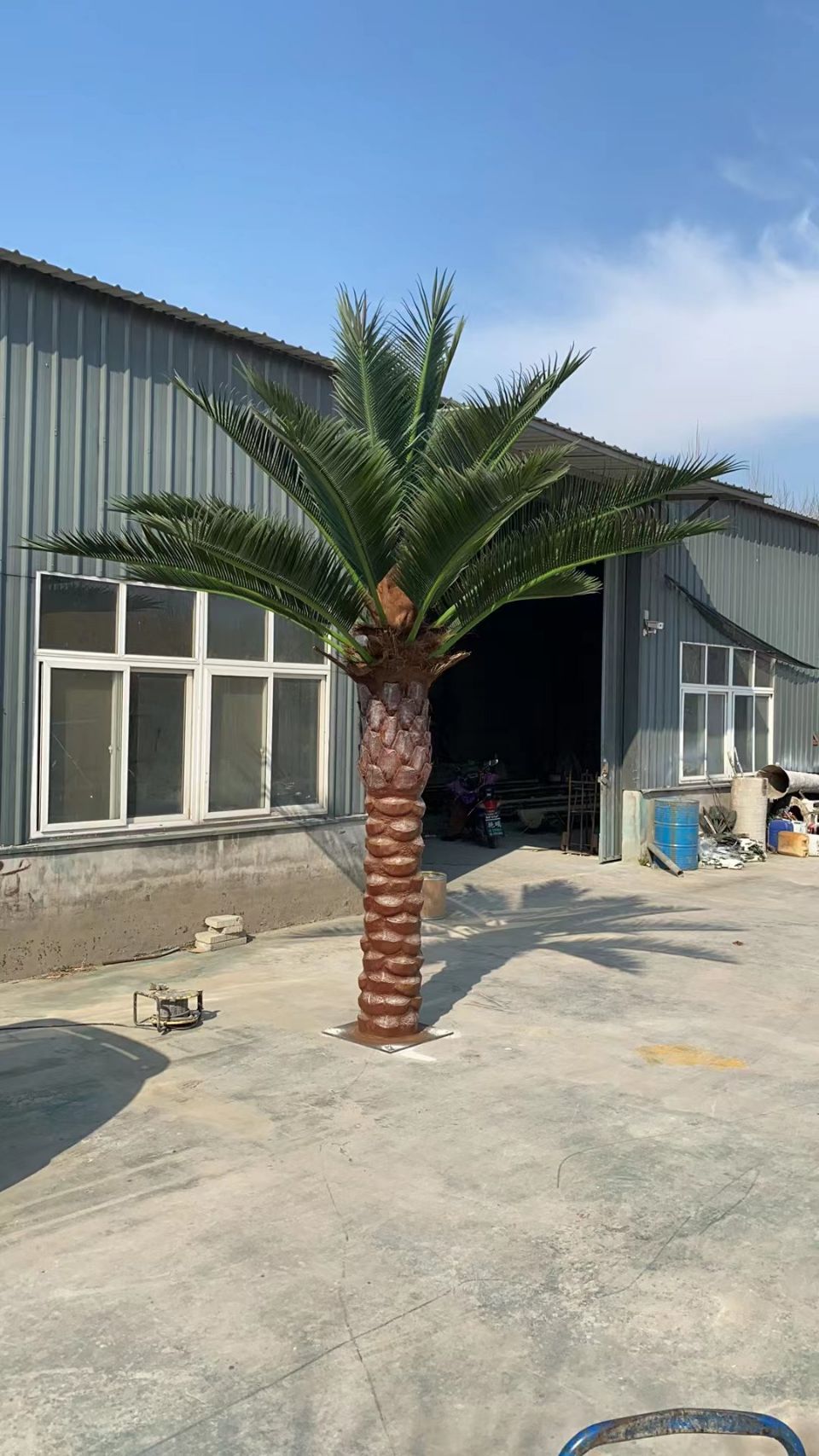 13ft tall Designer Plants USA Florida Palm artificial tree with lush green leaves, UV resistant, ideal for indoor or outdoor decor.