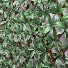 Artificial trellis privacy screen with English laurel design, UV resistant, by Designer Plants USA, ideal for outdoor garden decoration.