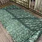 Artificial ivy privacy fence roll by Designer Plants USA, showing the trellis backing and lush green faux ivy for outdoor privacy.