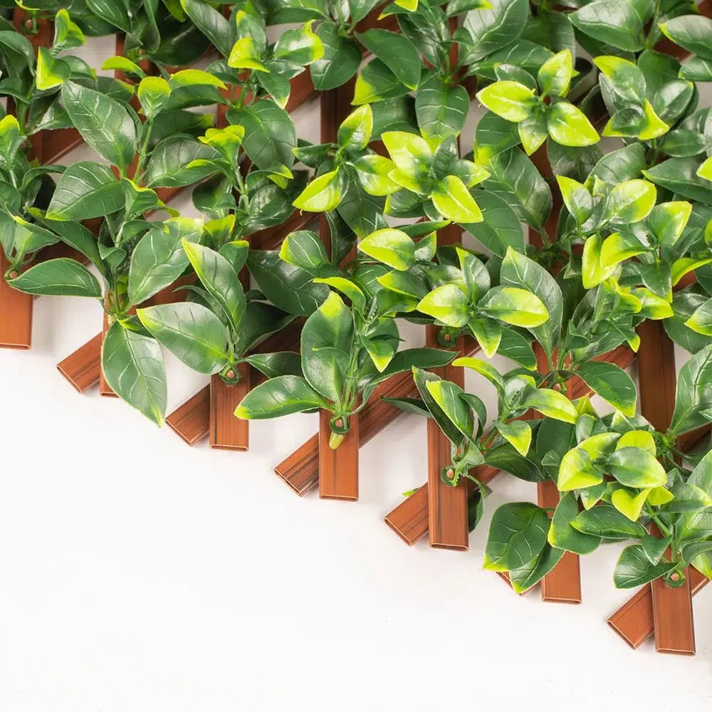 Jasmine expandable artificial trellis privacy screen with leafy foliage, PVC frame, UV resistant, measures 72x36 inches, by Designer Plants USA