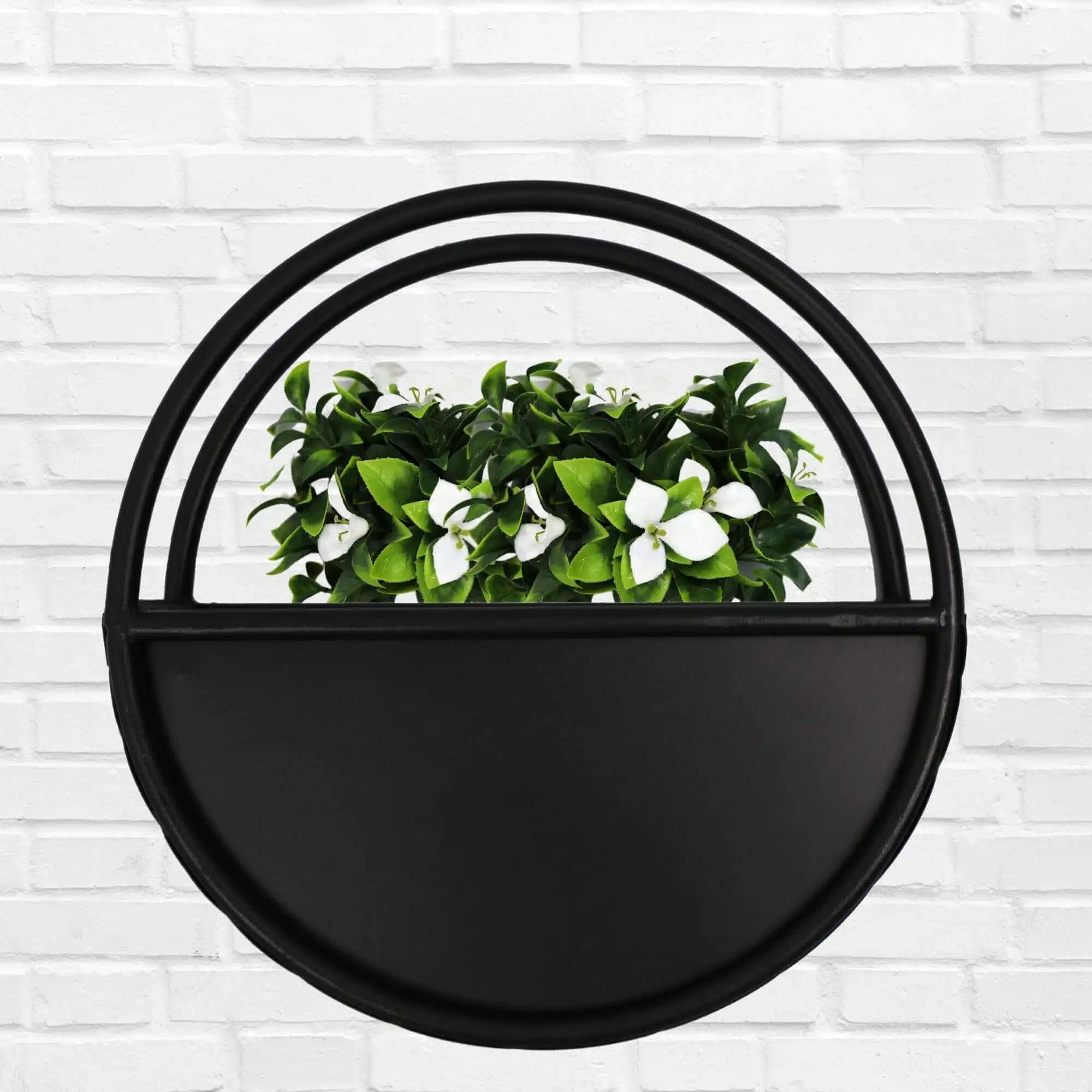 Onyx black floating half moon metal wall planter with artificial plants, 35cm, designed for modern home decor.