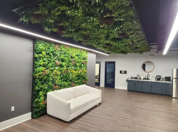 Artificial vertical garden wall panel by Designer Plants USA, used in a hair salon, showcasing lush, UV-resistant green wall decor.