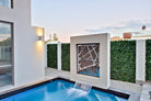 Artificial Boston Ivy vertical garden panel by Designer Plants USA, UV resistant green wall with lush ivy foliage, 40x40 inches.