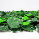 Close-up of Boston Ivy artificial green wall panel by Designer Plants USA, UV resistant, showcasing lush green foliage and vertical garden design.