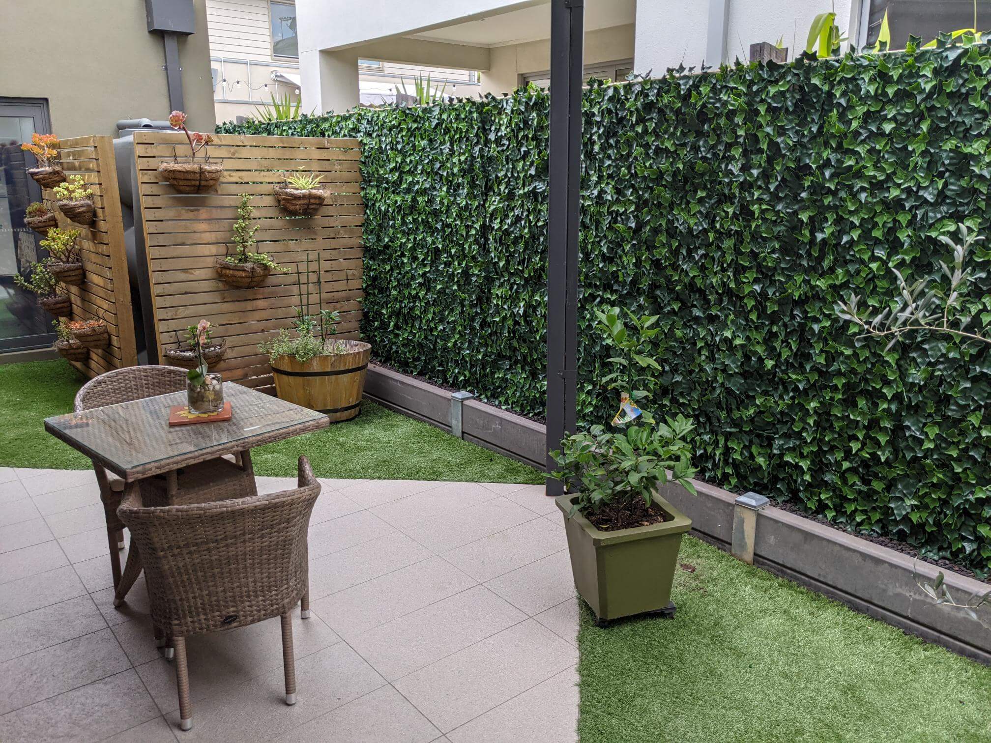 Artificial Boston Ivy vertical garden panel by Designer Plants USA, UV resistant living wall with lush green ivy design.
