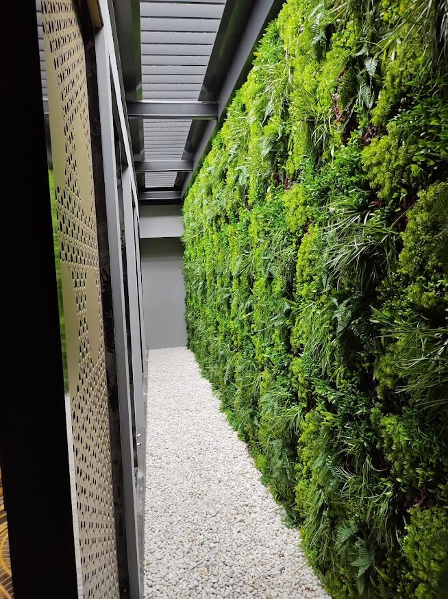 Artificial green wall panel by Designer Plants USA, 40x40 inch Country Fern vertical garden with UV-resistant, lush faux foliage.