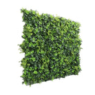 Dark green artificial boxwood vertical garden panel by Designer Plants USA, UV resistant, fire-rated, metal-backed for living wall displays.
