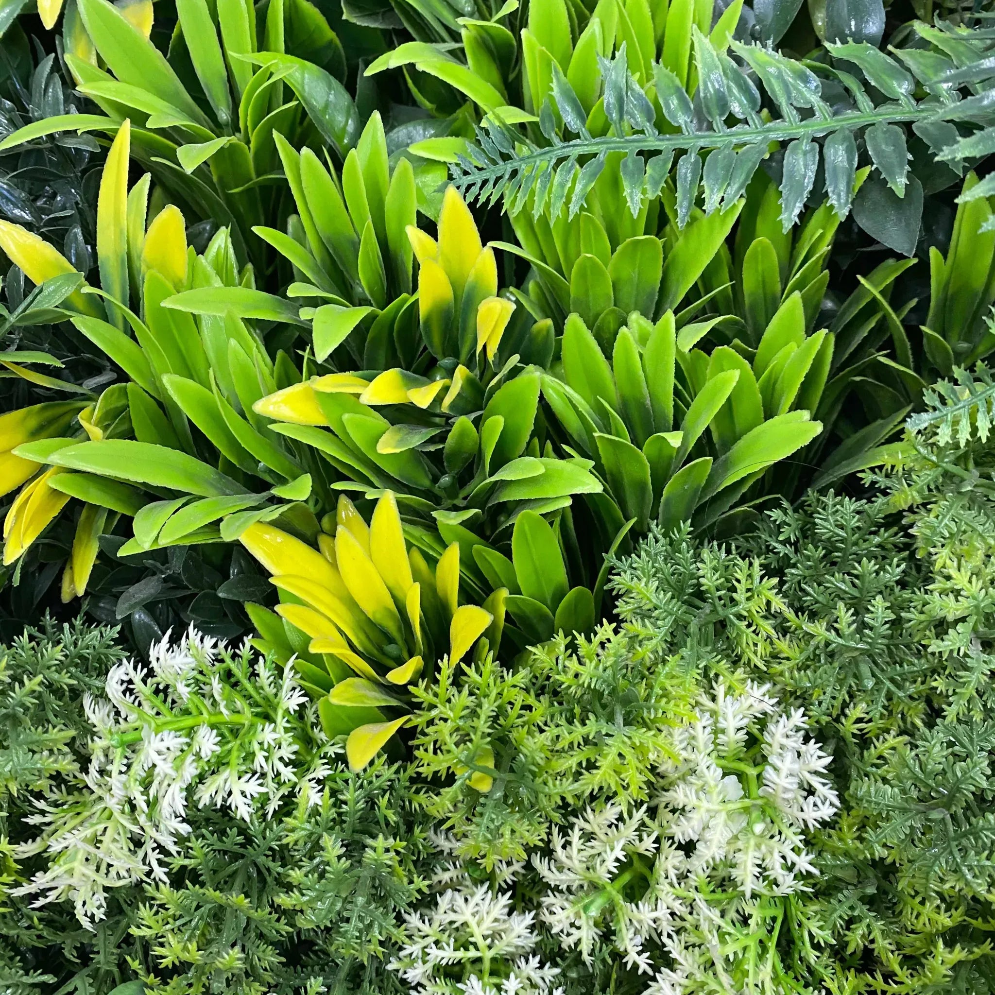 Artificial evergreen triptych living wall panels by Designer Plants USA, UV-resistant vertical garden set of 3 for commercial use.