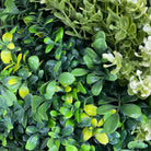 Artificial vertical garden wall panels by Designer Plants USA, UV resistant living wall panels for commercial green wall displays.