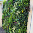 Artificial vertical garden panels by Designer Plants USA, Evergreen Triptych set of 3, showcasing lush green living wall panels.