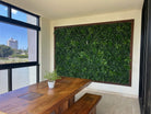 Luxurious green wall panel from Designer Plants USA, 40x40 inch artificial vertical garden with UV-resistant, commercial-grade living wall design.