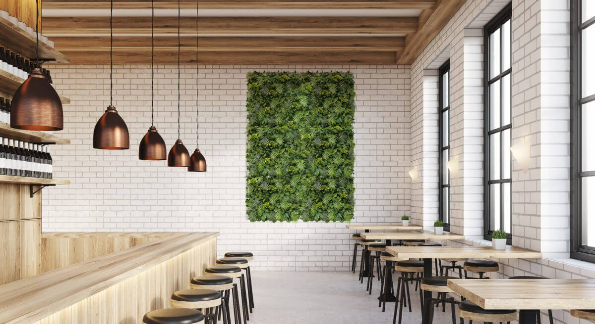 Artificial green wall panel featuring vibrant Hawaiian sunrise flowers, UV resistant, commercial grade living wall by Designer Plants USA