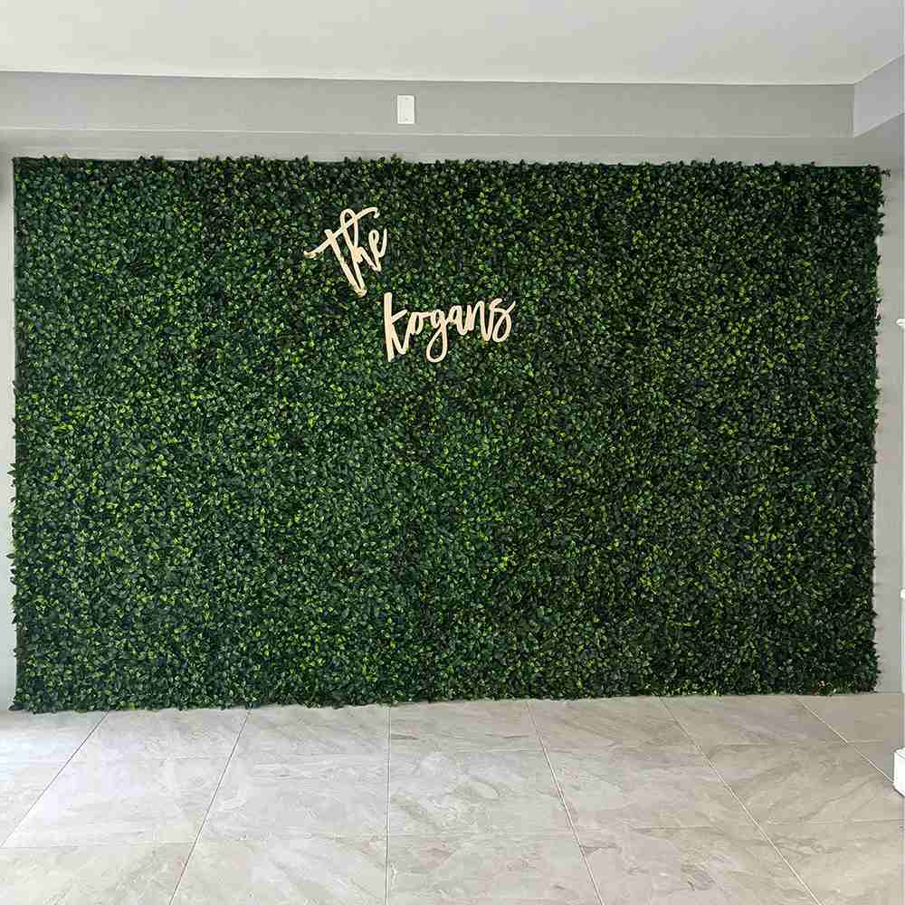 Artificial Jasmine Green Wall Panel by Designer Plants USA, 40x40 inch living wall with UV-resistant, commercial-grade design.