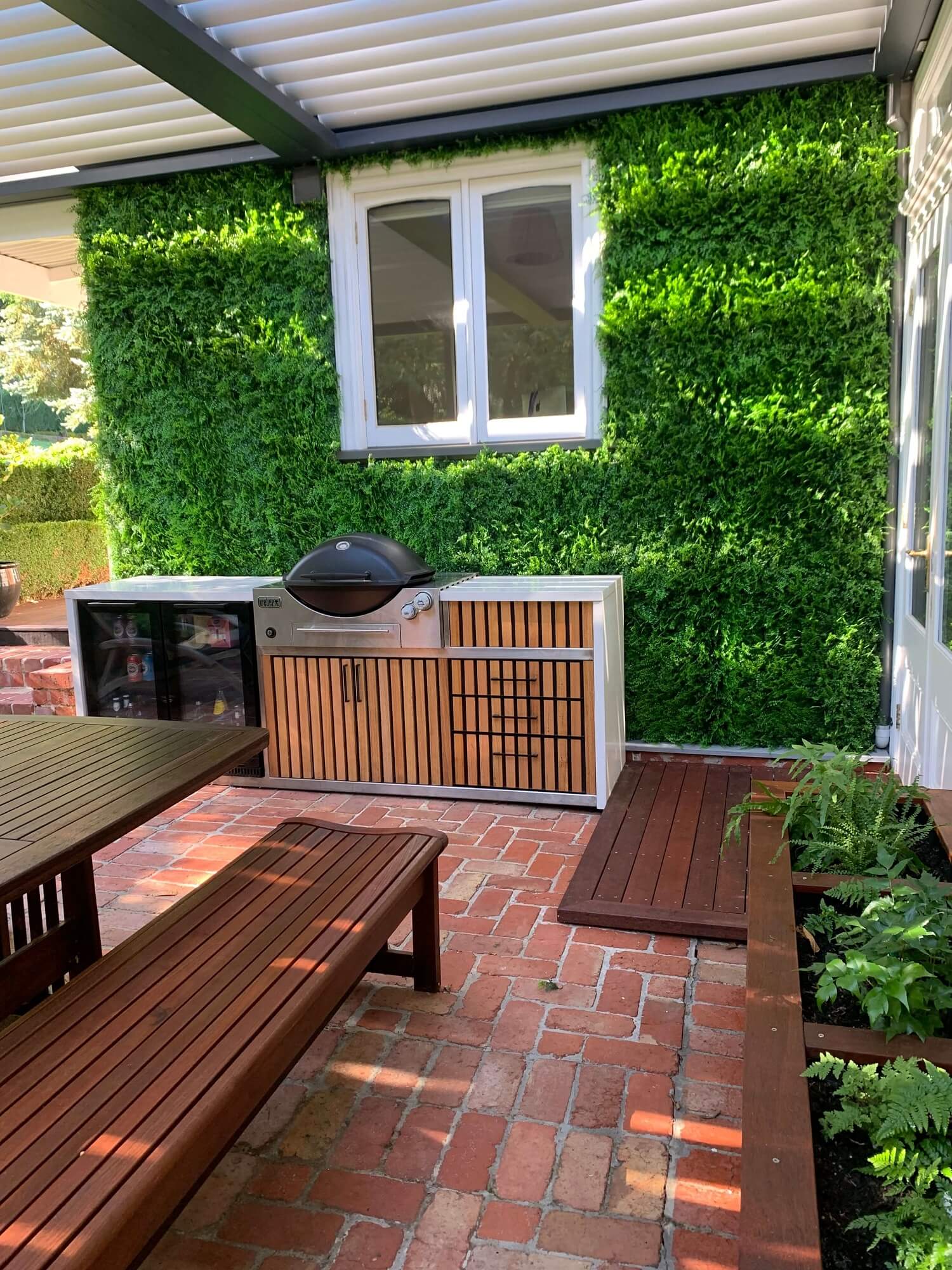 Artificial lush fern green wall panel by Designer Plants USA, 40x40 inch UV-resistant living wall for commercial use.