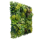 Artificial vertical garden wall panel by Designer Plants USA, lush spring green living wall with UV-resistant, commercial-grade design.