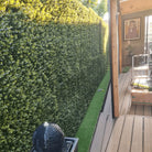Artificial boxwood vertical garden panel by Designer Plants USA, UV resistant living wall with lush green faux foliage, 40x40 inches.