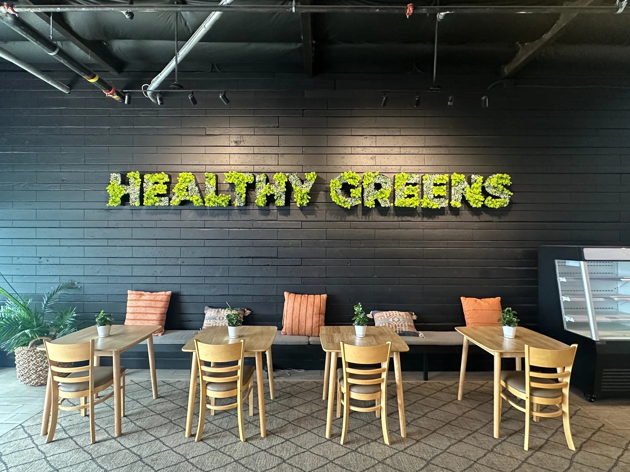 Artificial green and white moss wall panel for vertical gardens, UV resistant, commercial grade, 40x40 inches, by Designer Plants USA.