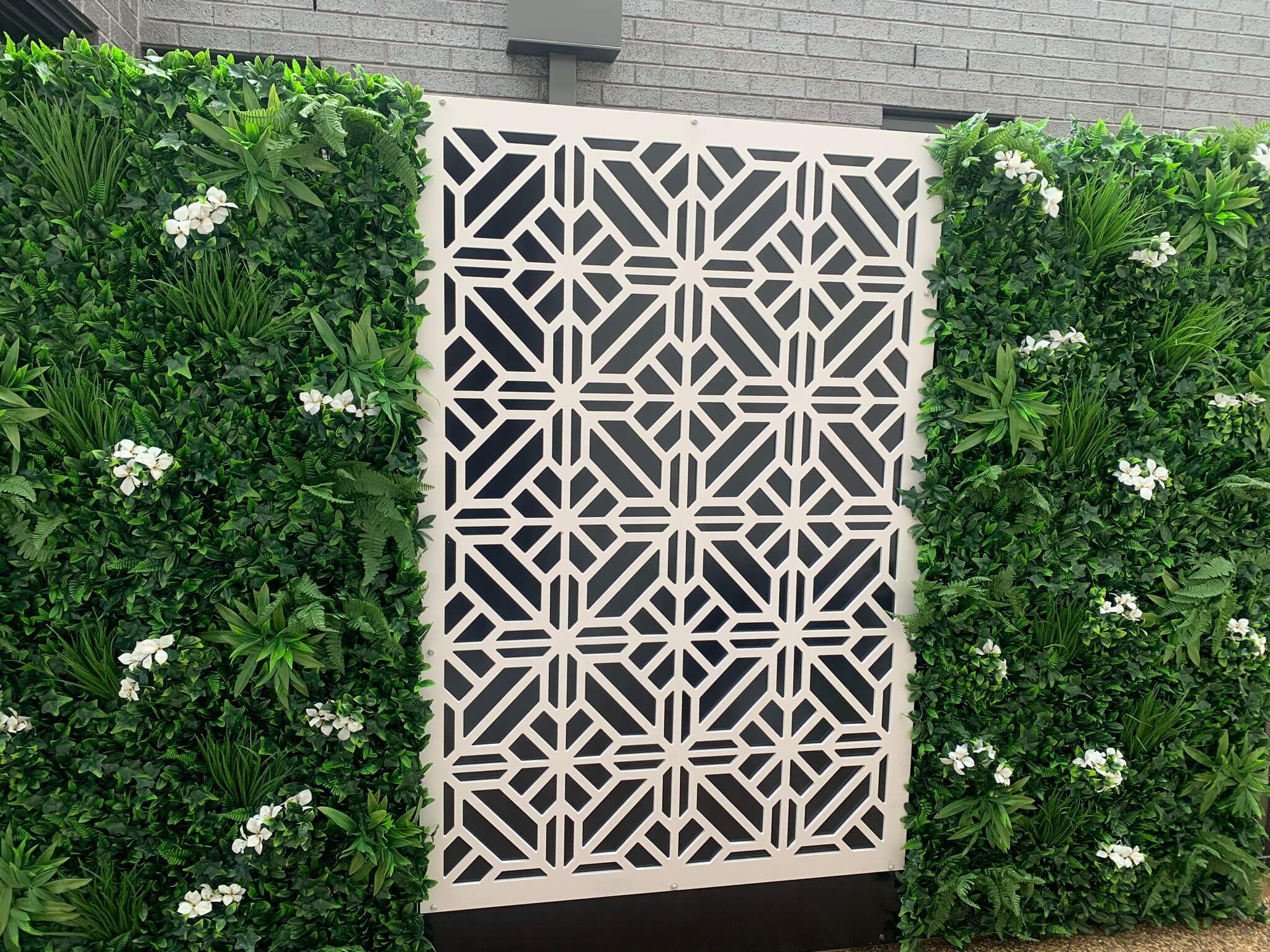 Snowy white artificial vertical garden wall panel by Designer Plants USA, UV resistant, 40x40 inches for commercial living wall decor.