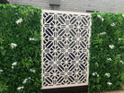 Snowy white artificial vertical garden wall panel by Designer Plants USA, UV resistant, 40x40 inches for commercial living wall decor.