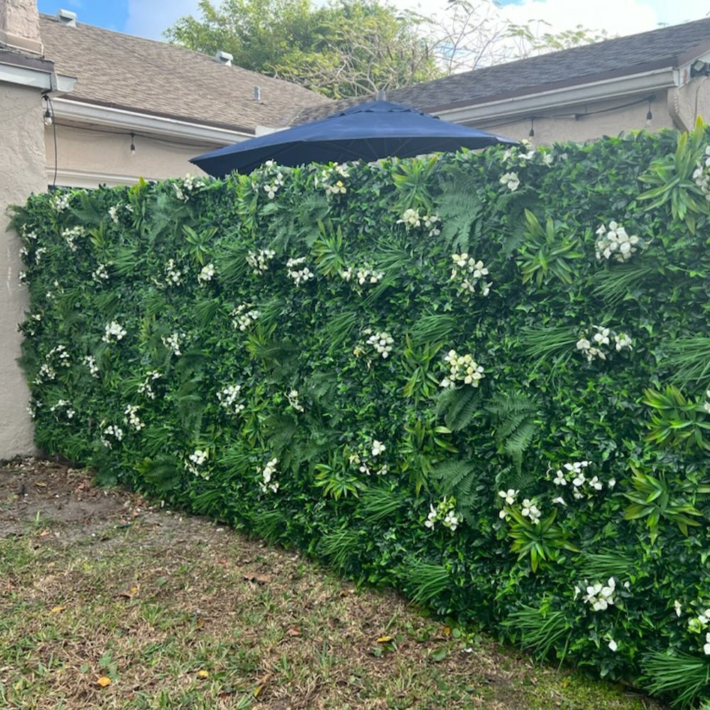 Snowy white artificial vertical garden wall panel by Designer Plants USA, UV resistant, 40x40 inches, for commercial living wall displays.