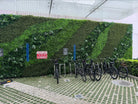 Snowy white artificial vertical garden wall panel by Designer Plants USA, UV resistant living wall for commercial or outdoor use