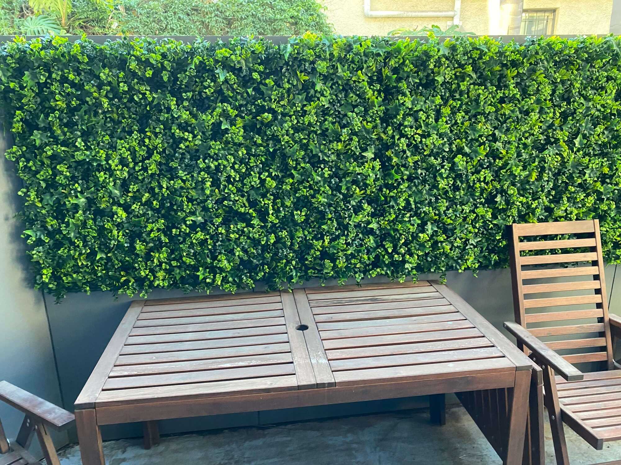 Vertical garden green wall panel by Designer Plants USA, 40x40 inch living wall with UV-resistant artificial plants.