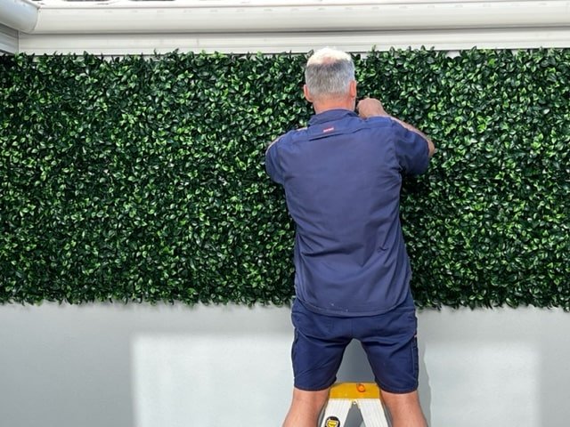 Artificial vertical garden wall panel by Designer Plants USA, UV resistant, 40x40 inch living wall for commercial or home use.
