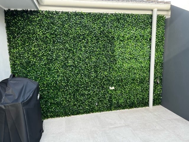 Spring Sensation artificial vertical garden wall panel by Designer Plants USA, UV resistant green wall for commercial or home use.