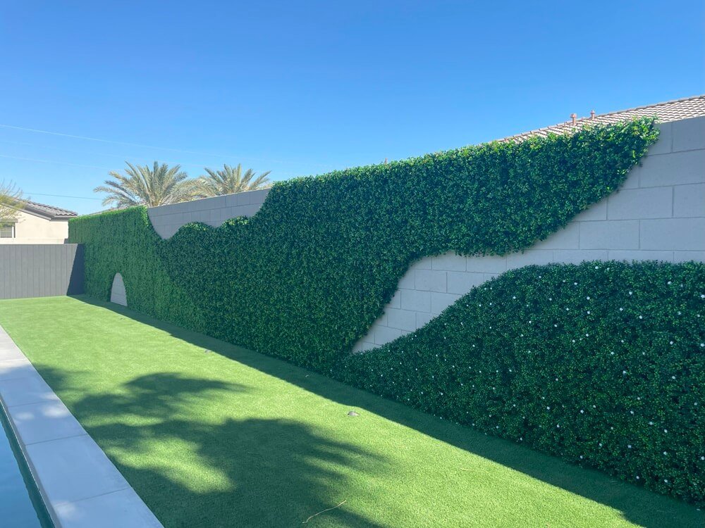 Artificial vertical garden wall panel by Designer Plants USA, UV resistant living wall with lush green foliage, 40x40 inches.
