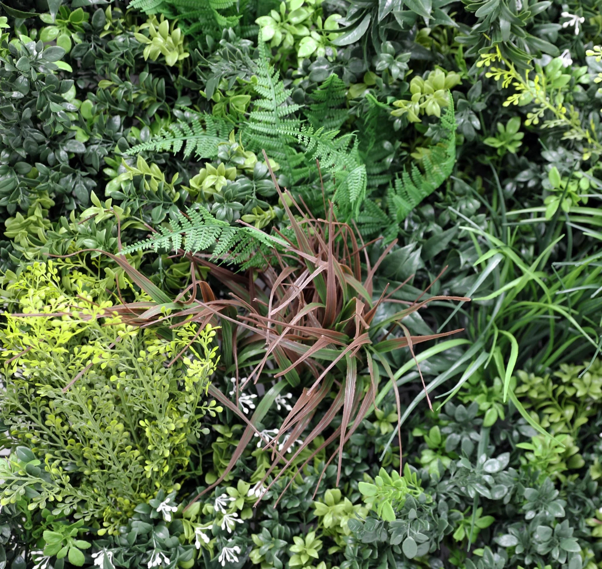 Lush artificial vertical garden wall panel by Designer Plants USA, 35x35 inches, UV resistant, fire-rated living wall for commercial spaces