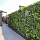 White Oasis artificial vertical garden wall panel by Designer Plants USA, UV resistant living wall for commercial or home use.