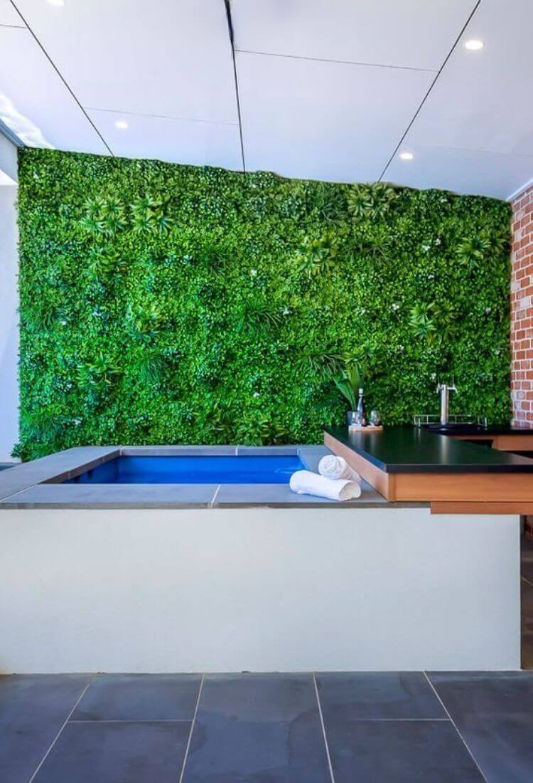 White Oasis artificial vertical garden wall panel featuring lush flowering plants, UV resistant, 40x40 inches, commercial grade.