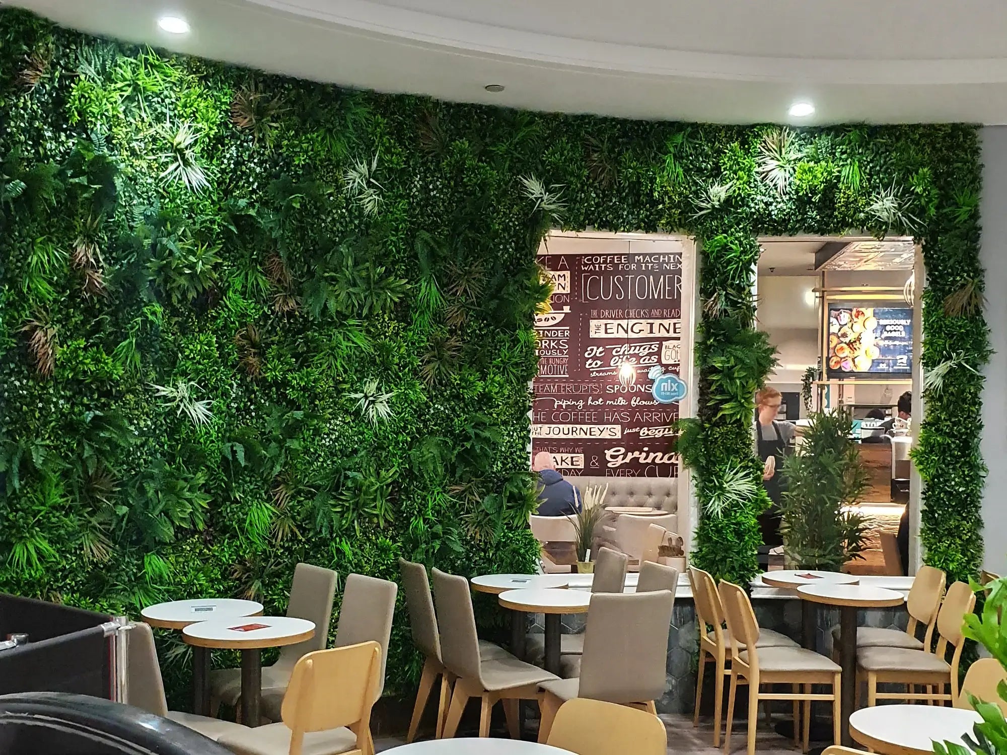 Wild Tropics artificial vertical garden wall panel by Designer Plants USA, UV-resistant living wall for commercial spaces.