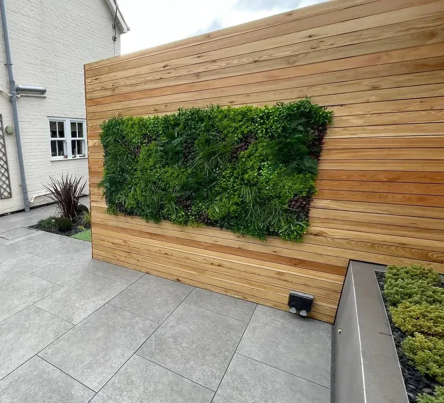 Small sample of Designer Plants USA Country Fern vertical garden panel with artificial fern leaves for outdoor wall decoration.