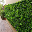 Small sample panel of Lavender Fields green wall by Designer Plants USA, showcasing lush artificial lavender and greenery.
