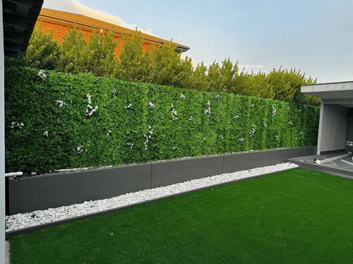 Small Designer Plants USA lush fern green wall panel sample with faux fern and ivy, showcasing realistic artificial plant textures.